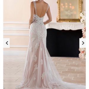 This is a wedding dress never worn. I ordered a different one so I am selling.